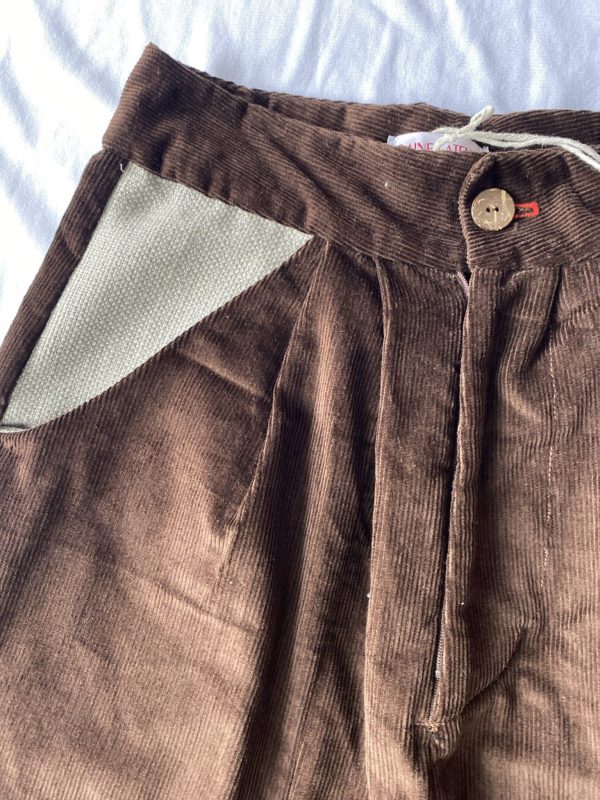 Brown corduroy high waisted trousers with wool pocket, wooden button and right red button hole