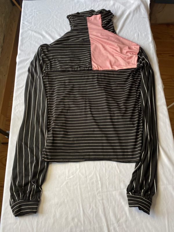 Quarantee in Black Stripe with Pink Panel Flat Lay back. Top with facemask built in