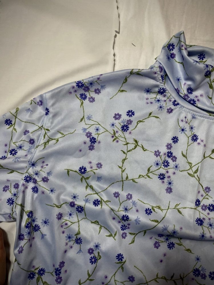 Purple and blue floral oversized turtleneck in deadstock vintage jersey.