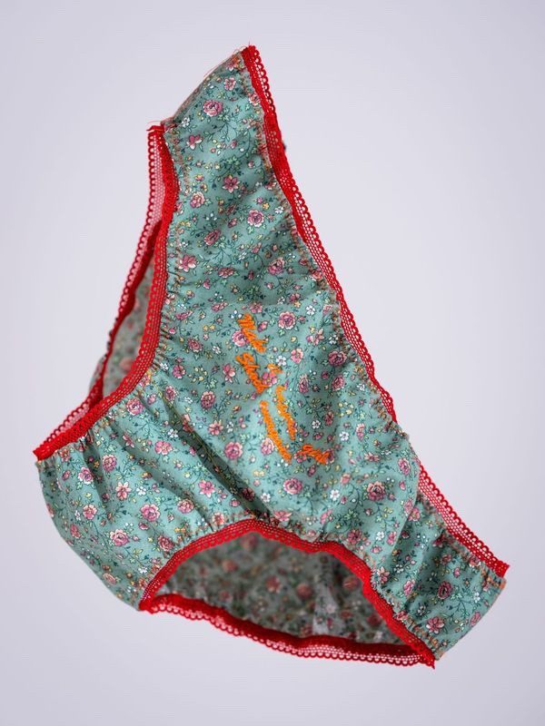 Floral Panties Handmade with body positivity quote make it happen girl shock everyone on them. Red knicker elastic. Floating image by Yousef Al Nasser.