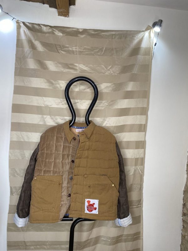 Front of the quilted brown jacket made from upcycled materials