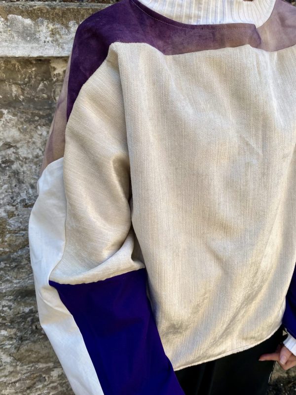 Purple batwing jumper upcycled from vintage remnants and textile piece. Sustainable designer