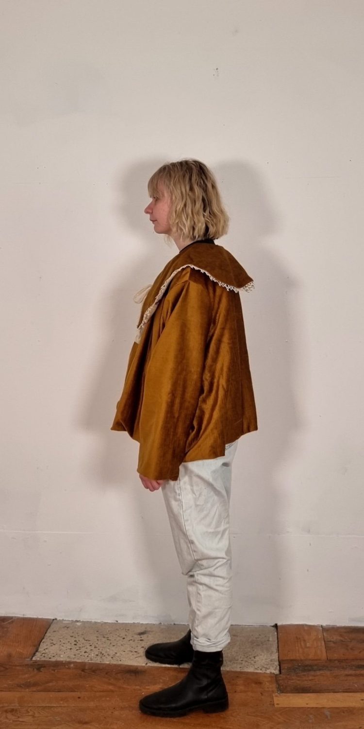 Oversized Aesthetic Bed Jacket with a Large Cape Collar and Dropped Shoulder for Women. Made from a variety of Vintage Textiles and Remnants rich in texture and colour. The Collar trim is a vintage lace kindly donated by Gillian. The silhouette echoes bed jackets from the 1940s with a contemporary twist.