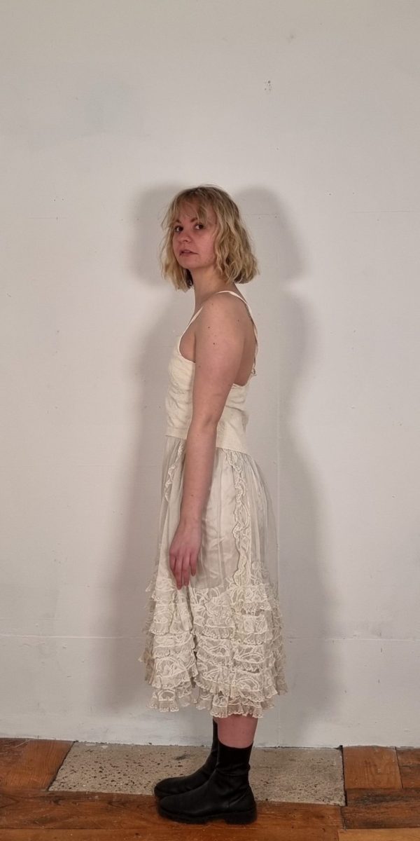 Wedding Drop Waisted Dress in Midi Length, with a Trapeze Voluminous Skirt for Bride. Made from Vintage Textiles and Lace Remnants dating back to the 1930s. These dresses are inspired from Silhouettes from the 1920s and take on a contemporary perspective. 