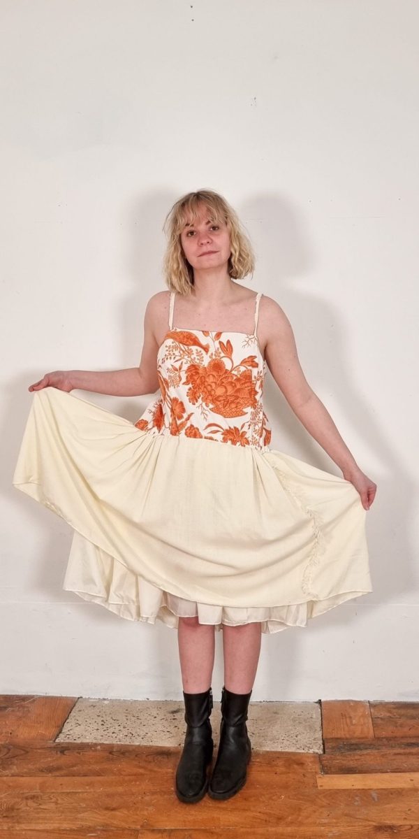 Casual Drop Waisted Dress in Midi Length, with a Trapeze Voluminous Skirt for Summer. Made from Vintage Textile Remnants dating back to the 1960s. These dresses are inspired from Silhouettes from the 1920s and take on a contemporary perspective. 